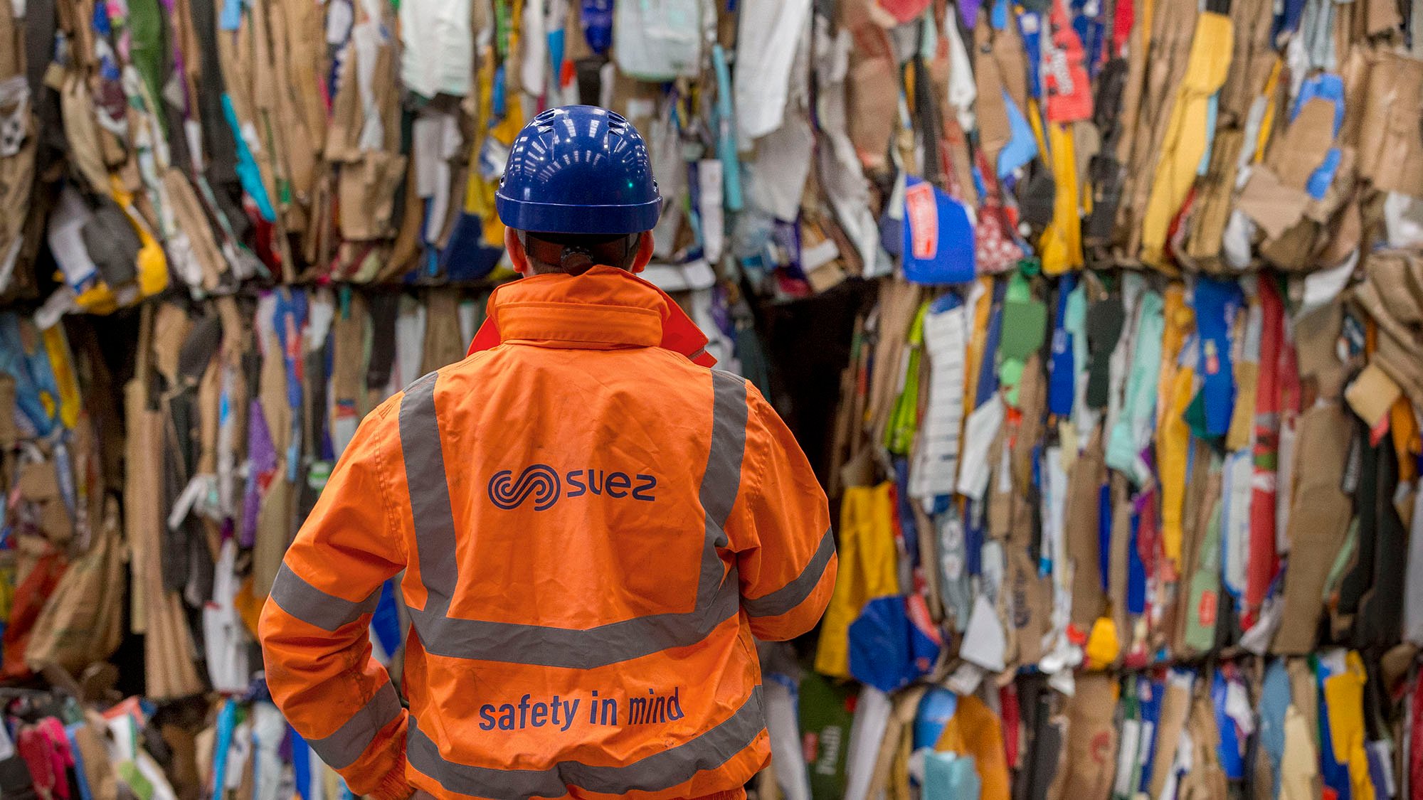 Avonmouth   Employee in front of recycling bales